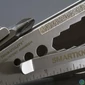 Kép 6/8 - True Utility Smartknife+, TU6869, 15 in 1, mágneses bitfej tartó, kábelcsupaszoló, homokfúvott rozsdamentes acél, 5,5 cm penge
